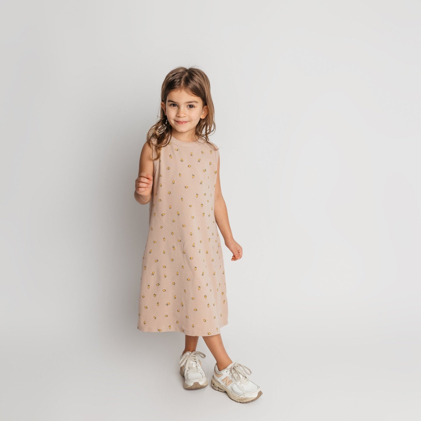 Toddler wearing soft cotton tan lemon maxi dress - comfortable quality children's clothing