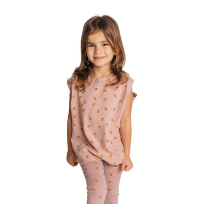 Child wearing mauve mandarin sleeveless shirt in loose comfortable fit - quality cotton toddler tee
